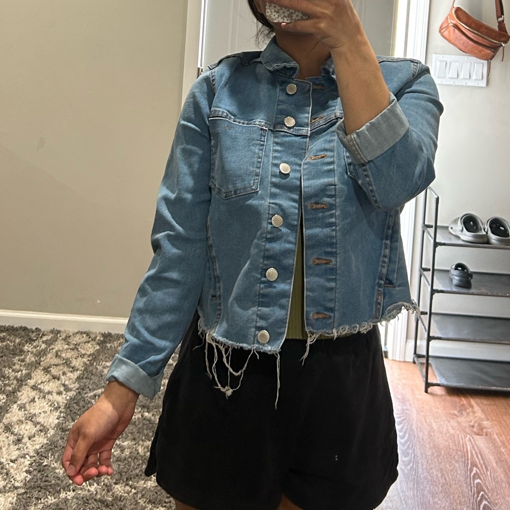 Light Blue Jean Jacket with Distressed Look and Cropped Cut
